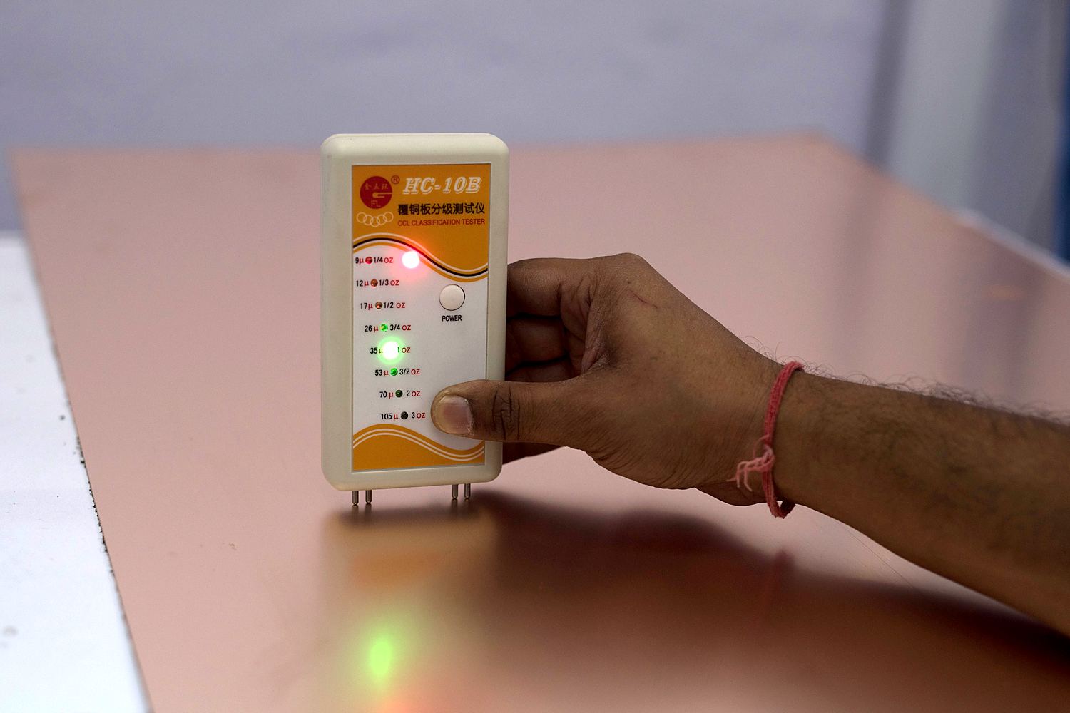 Panel test with a handheld meter, Sara Circuits plant, Barwala
